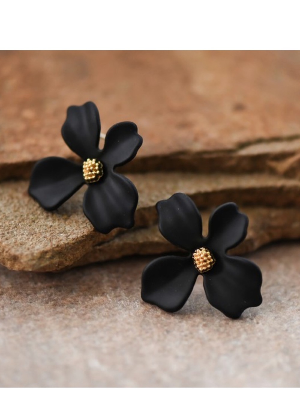 699. Black hand painted floral post earrings